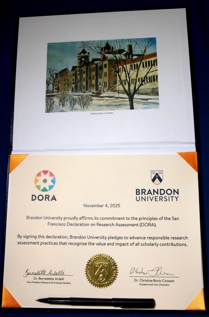 A certificate says "Brandon University proudly affirms its commitment to the principles of the San Francisco Declaration on Research Assessment (DORA). By signing this declaration, Brandon University pledges to advance scholarship research assessment practices that recognize the value and impact of all scholarly contributions."