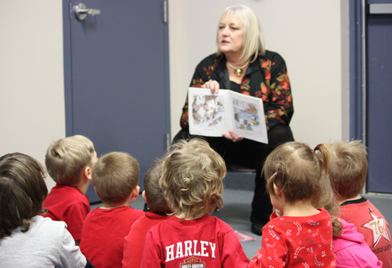 BU President Dr. Poff reads to pre-schoolers during 