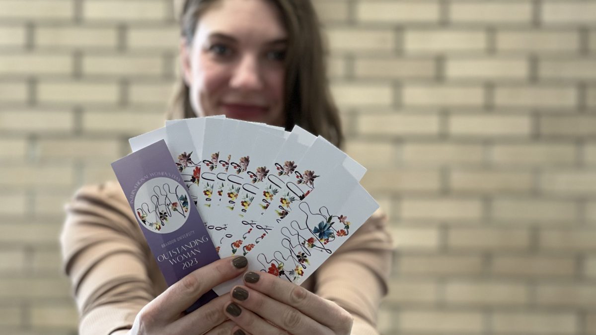 Morganna Malyon shows off the 2023 bookmarks.