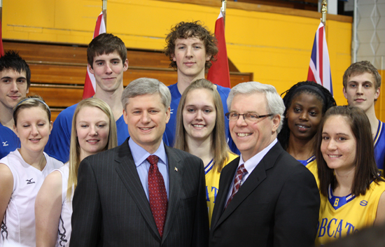Prime Minister Stephen Harper, Premier Greg Selinger and several Bobcat athletes.