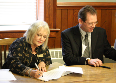 BU President & Vice Chancellor, Dr. Deborah Poff signs agreement with ACC Interim President & CEO, Mr. Jim Brinkhurst