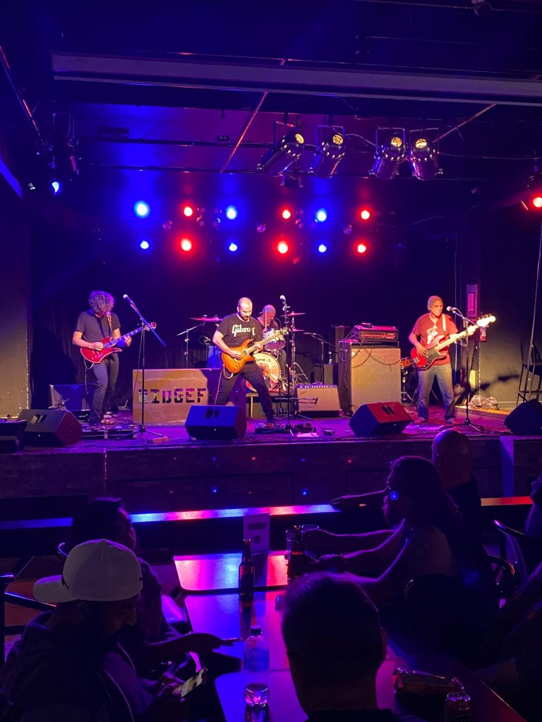 A band performs on stage.