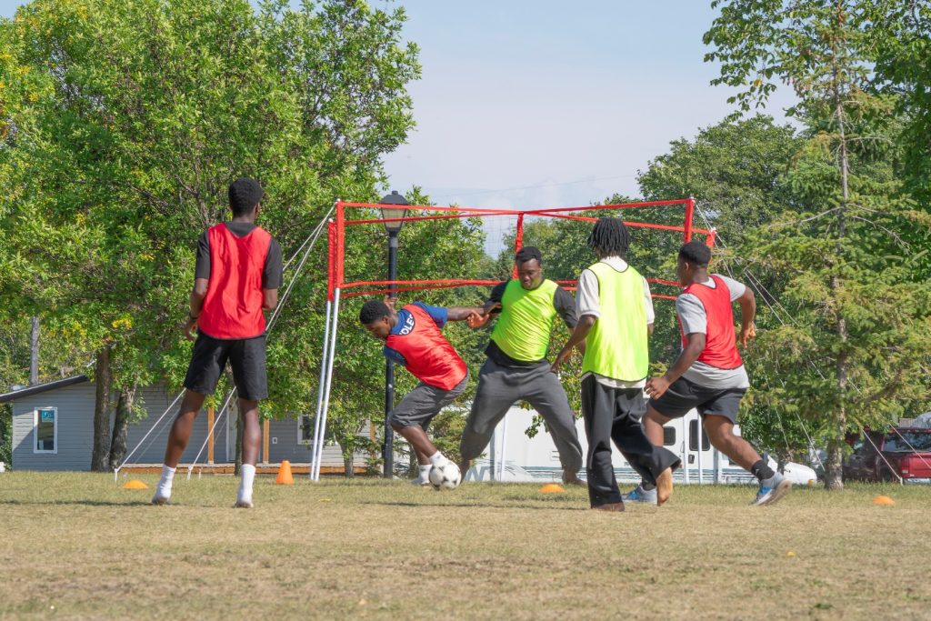 People play soccer