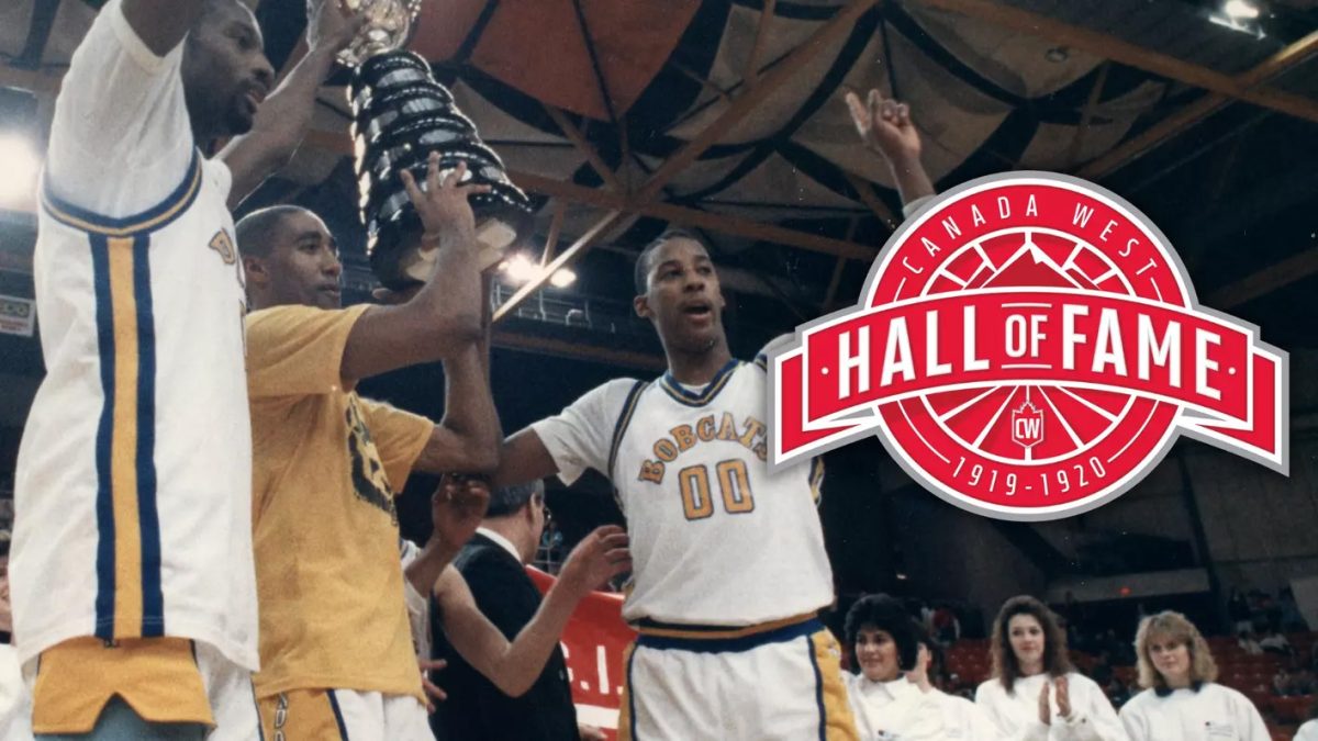 Basketball players hold up a trophy. A red graphic on the picture says "Canada West Hall of Fame"