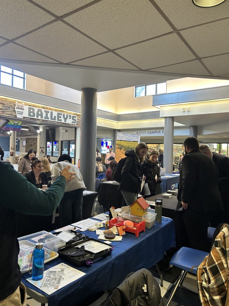 Students connect with employers at a career fair.