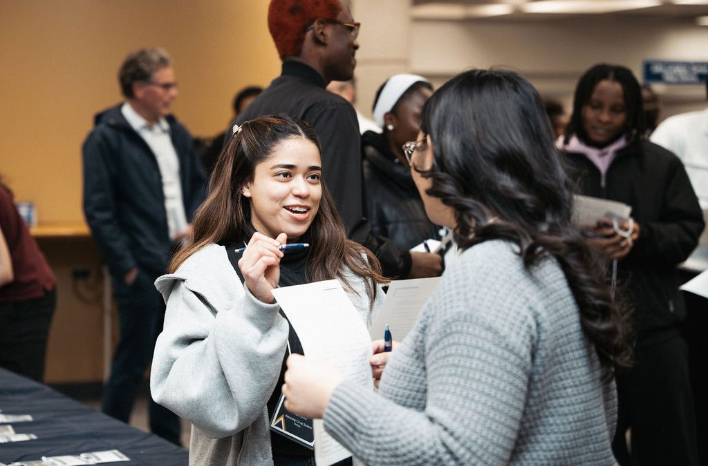 Co-op students mingle at an event earlier this year.
