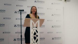 A woman at a podium