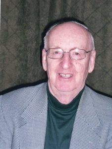 Smiling man in glasses