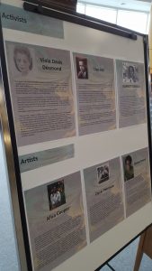 A white board features photographs and bios of those recognized for Black History Month.