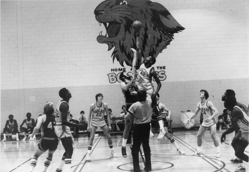 Brian Pallister, wearing No. 54, goes up for the tip-off in this undated file photo.