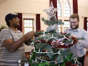 Brandon University Students' Union Vice-President External Rhoni Mohanraj and President Joel Springer decorate for 2014 Campus Christmas