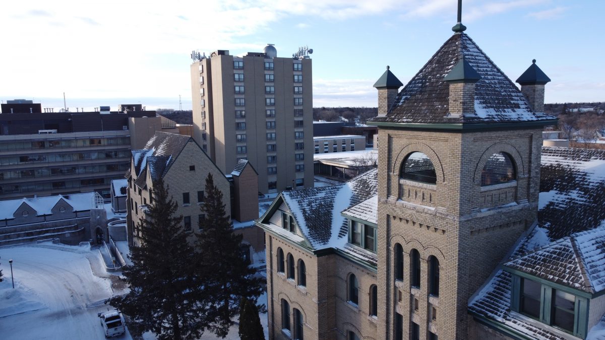 Aerial photo of the Brandon University campus in winter, with Clark Hall in the foreground.