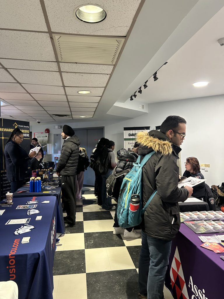 Students connect with employers at a career fair.
