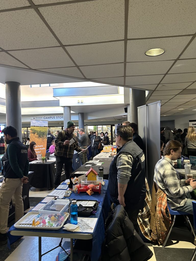 Students connect with employers at a career fair.