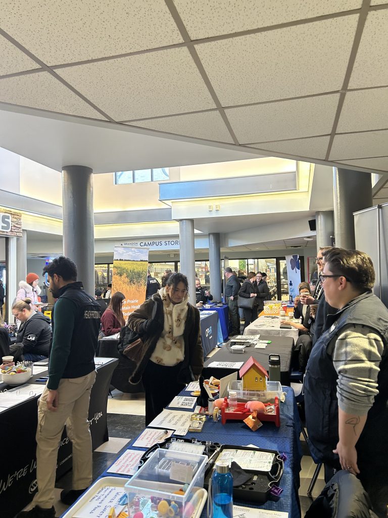Students connect with employers at a career fair.