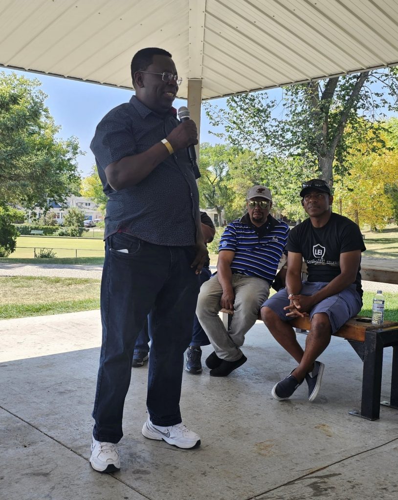 A man speaks into a microphone